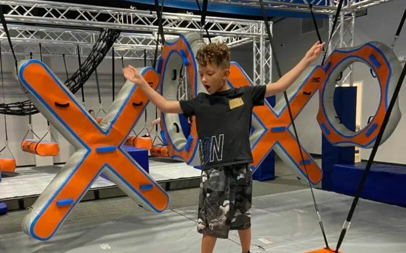 Boy building confidence at The Ninja Gym